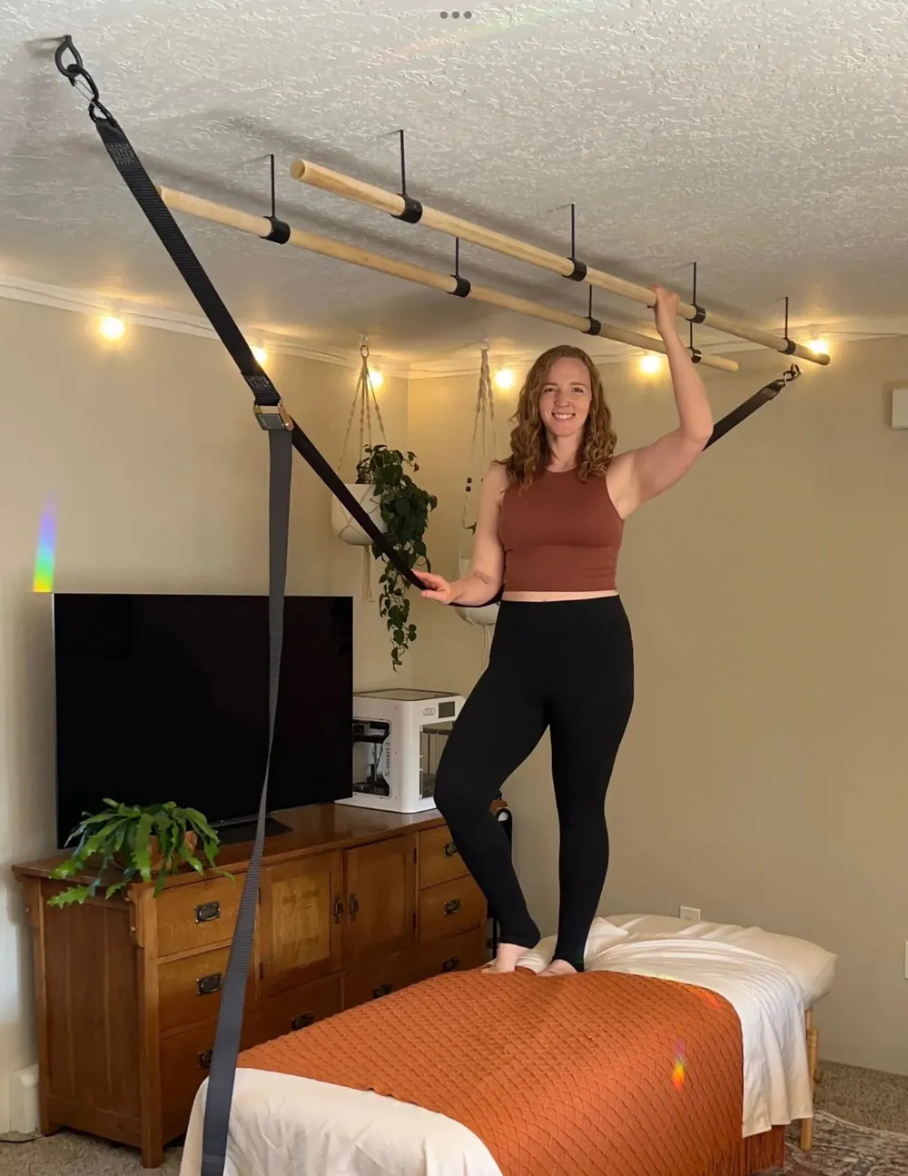 Jacie demonstrating Ashiatsu barefoot massage technique
